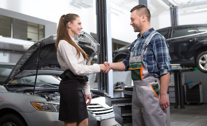 Woman customer with mechanic